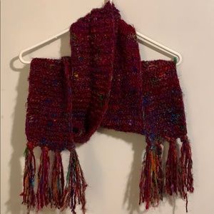 Multi color Rising Tide brand scarf.